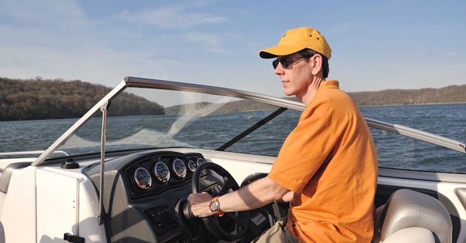 Man piloting a boat